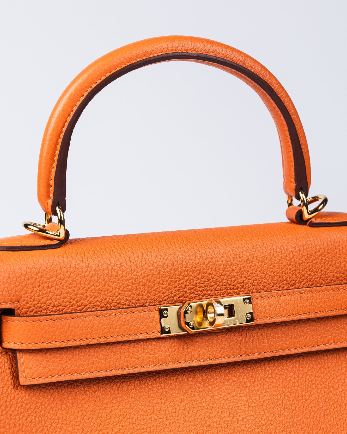 Kelly 25 Orange in Togo Leather with Gold Hardware