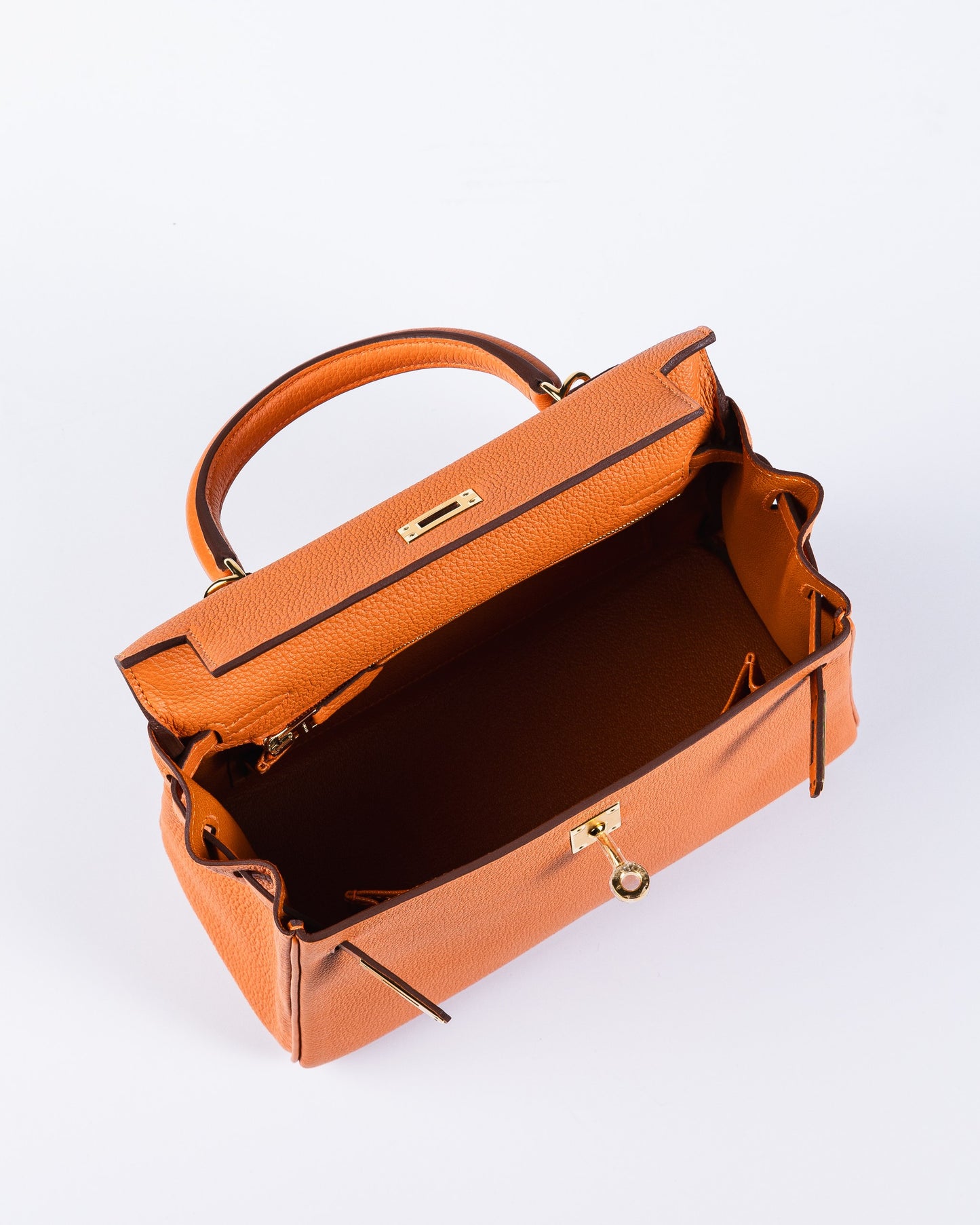 Kelly 25 Orange in Togo Leather with Gold Hardware