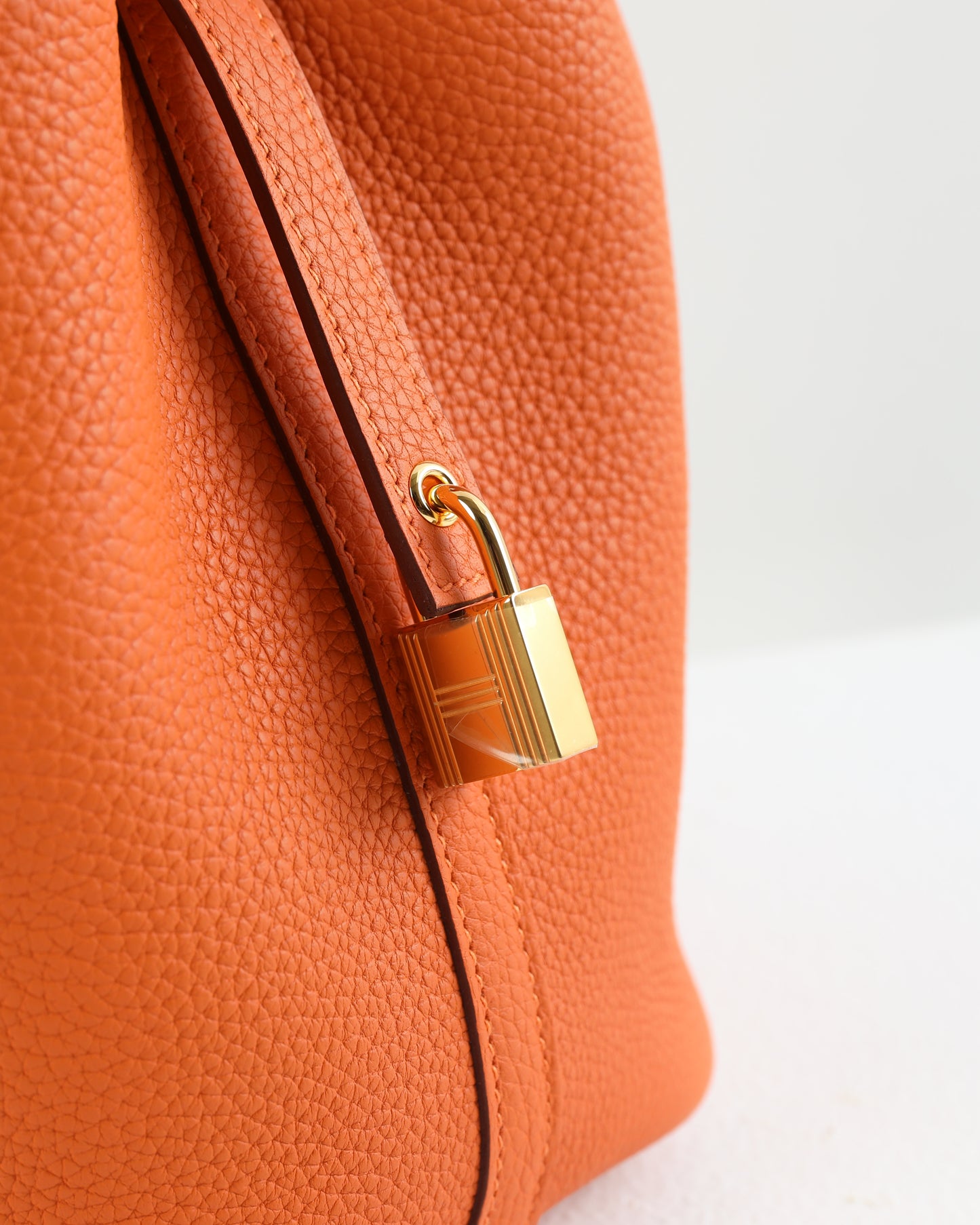 Picotin 18 Orange in Clemence Leather with Gold Hardware