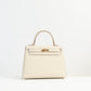 Kelly 25 Sellier Craie Epsom with Gold Hardware