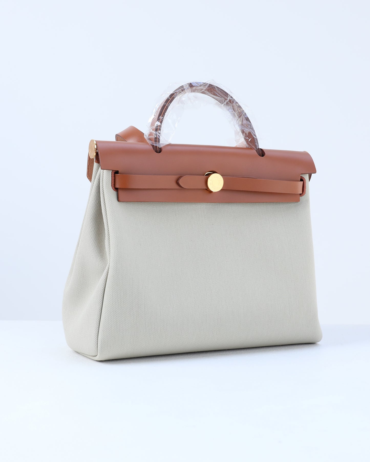 Herbag Zip 31 in Tan Vache Hunter and Beton Toile with Gold Hardware