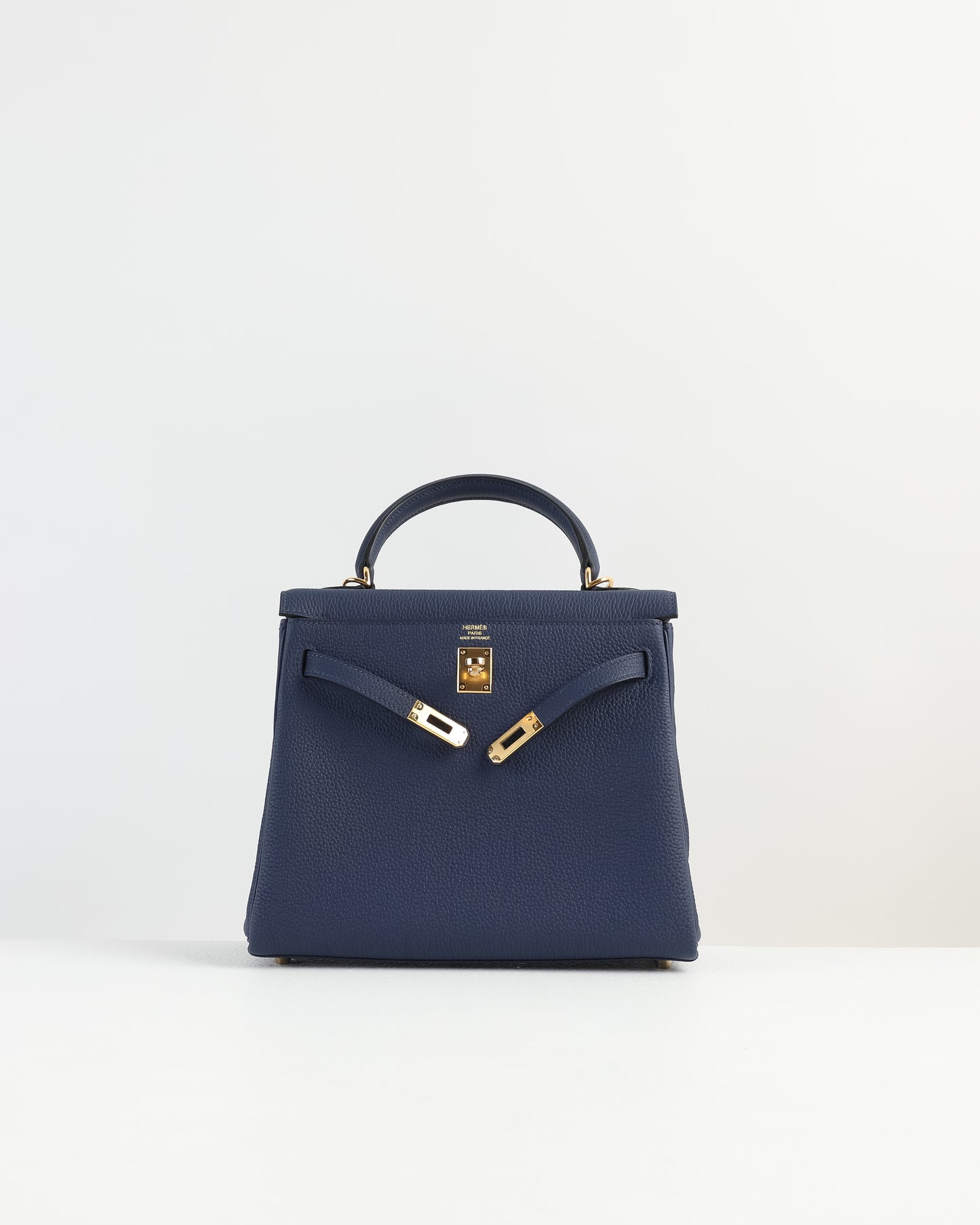 Kelly 25 Bleu Nuit in Togo Leather with Gold Hardware