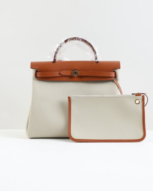 Herbag Zip 31 in Tan Vache Hunter and Beton Toile with Gold Hardware