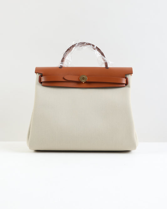 Herbag Zip 31 in Tan Vache Hunter and Beton Toile with Gold Hardware