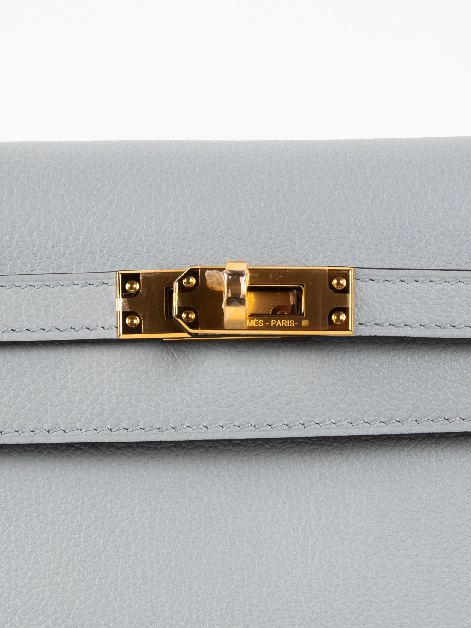 A GOLD EVERGRAIN LEATHER KELLY DANSE WITH GOLD HARDWARE, HERMÈS
